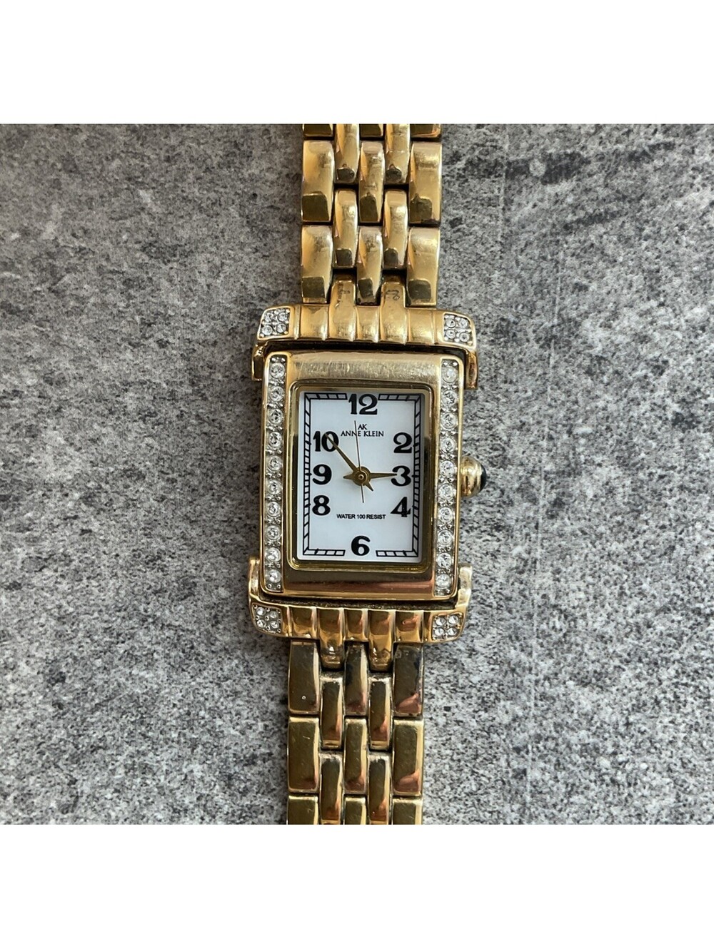 Anne Klein Womens Tank Style Watch 25mm Gold Tone Case & Band MOP Dial Bin O